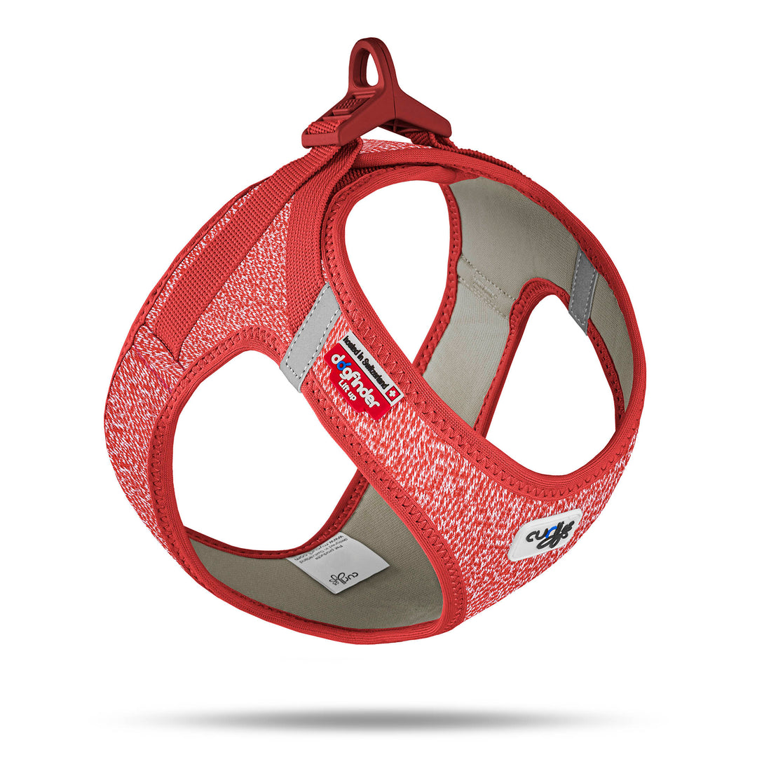 Ein Curli Geschirr Merino - Rot, gekennzeichnet durch sein Innenfutter aus 87% Merino Wolle und leichtes, luftdurchlässiges Air-Mesh Obermaterial. Es hat verstellbare Klettverschlüsse und reflektierende Elemente für zusätzliche Sicherheit in der Dunkelheit.